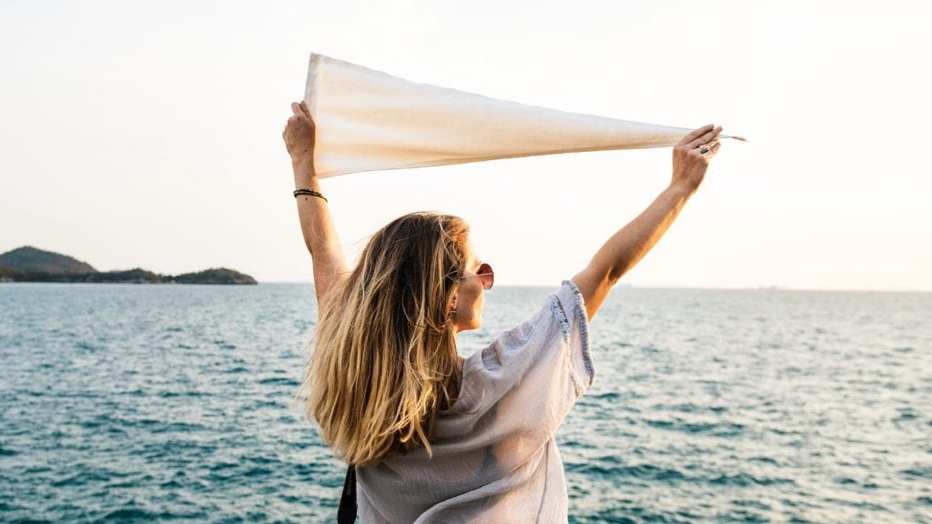 a woman holding a flag