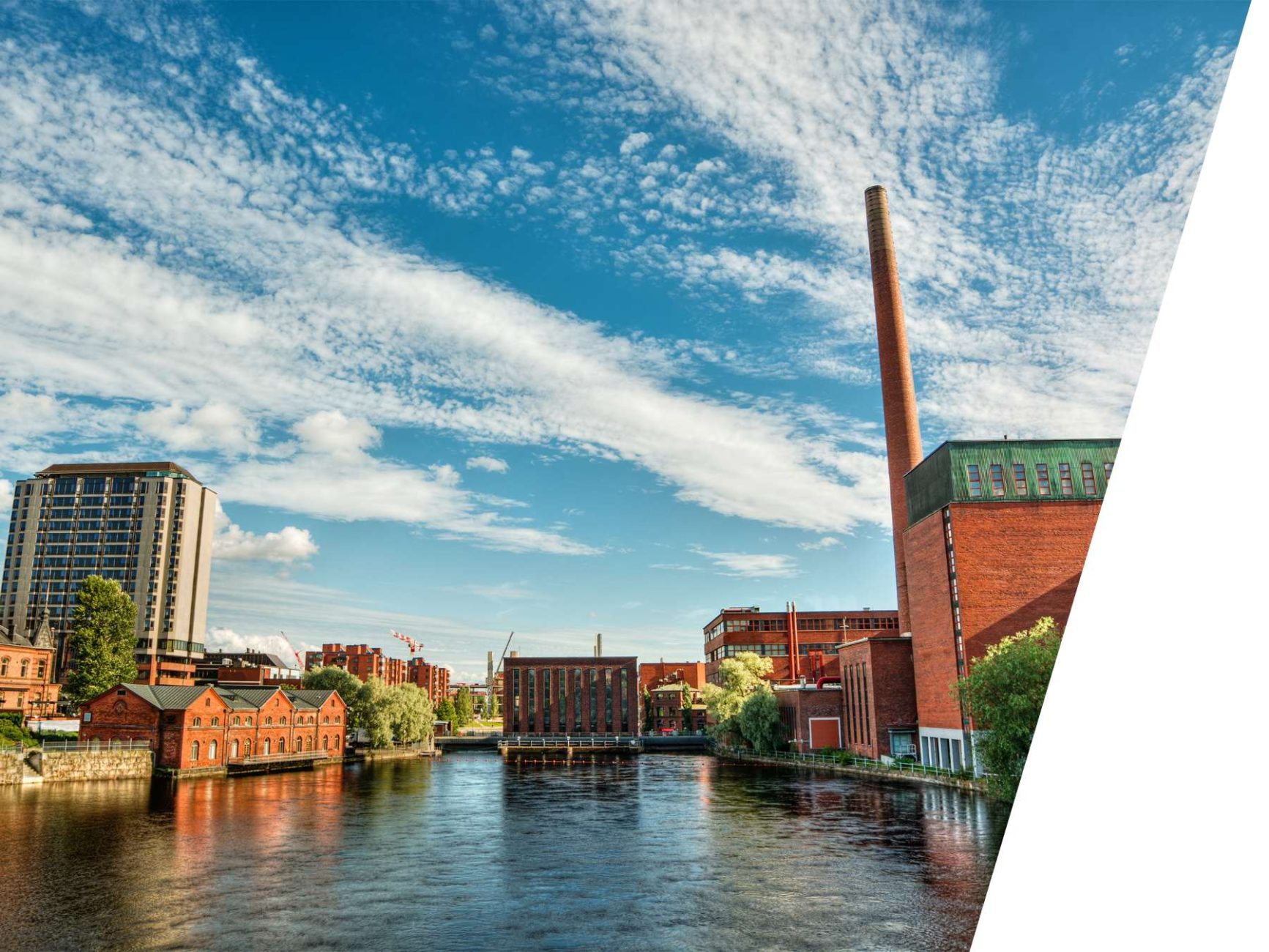 View of the Tammerkoski Rapids under a blue sky.