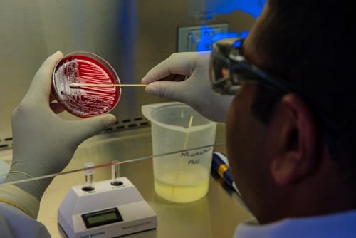 man is making tests in a laboratory