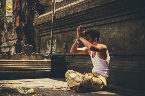 a man is performing a religious ritual