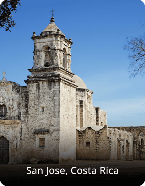 Old church in Costa Rica with rustic architecture, weathered stone walls, and a historic, peaceful atmosphere.