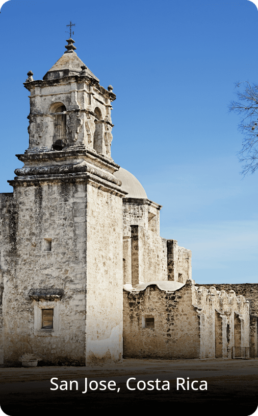Old church in Costa Rica with rustic architecture, weathered stone walls, and a historic, peaceful atmosphere.